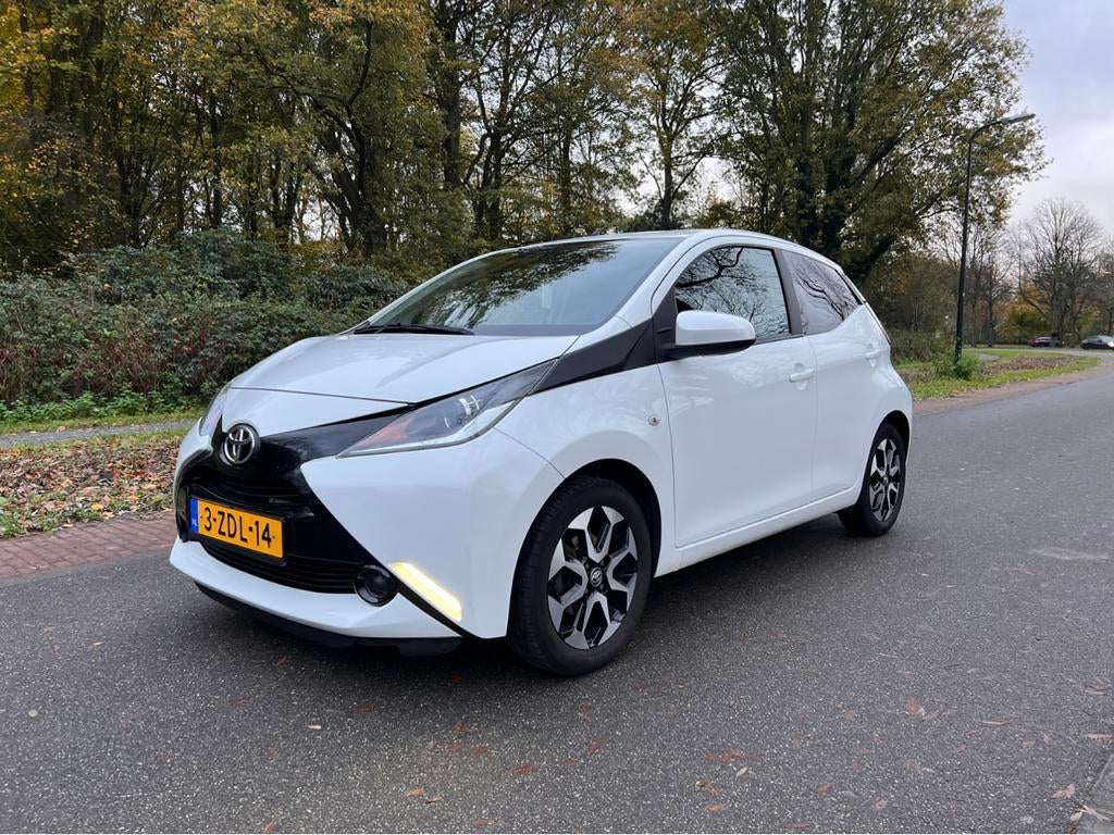 Toyota Aygo 1.0 12V Vvt-i 5-drs 2014 Wit, Voorwielaandrijving, Stof, 4 stoelen, Wit