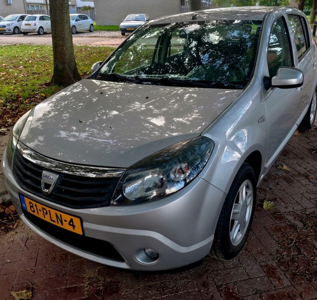 IZGST Dacia Sandero BlackLine 1.1 16V 2011 Grijs Airco, Auto's, Voorwielaandrijving, Stof, 74 pk, Origineel Nederlands