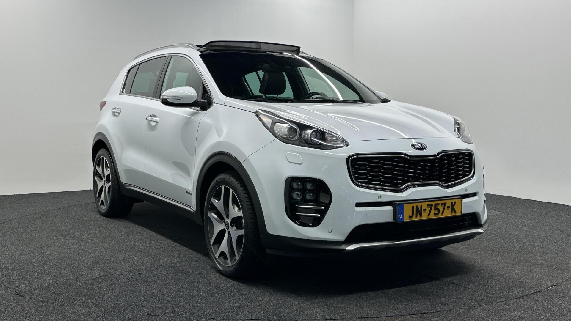 Kia Sportage 1.6 T-GDI 4WD GT-Line PANO LEER NAVI CAMERA STO, Auto's, Gebruikt, 4 cilinders, Met garantie (alle), Wit