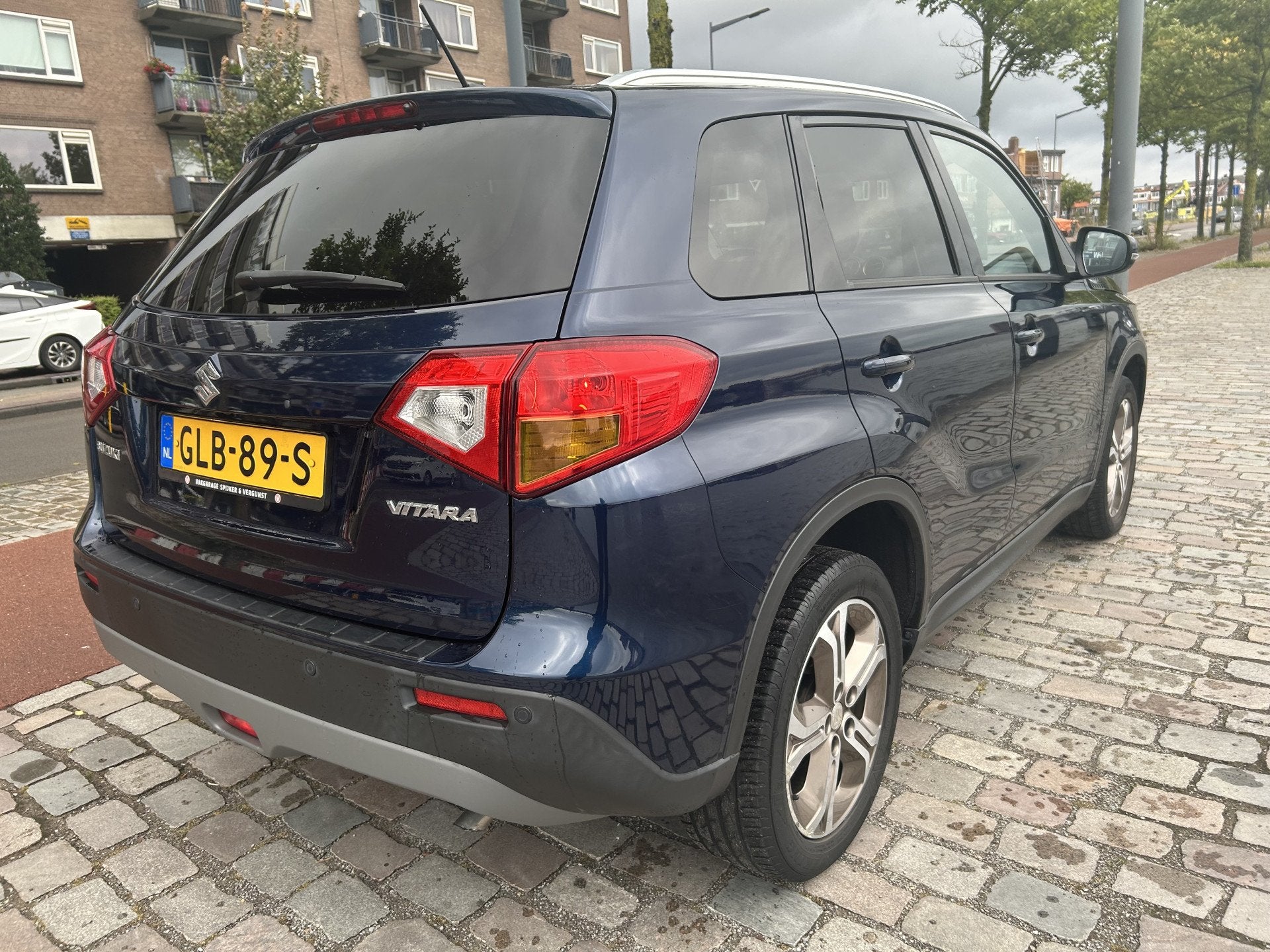 Suzuki Vitara 1.6 High Executive Pano Airco/ECC Navi Leer 1e, Auto's, Voorwielaandrijving, Gebruikt, 4 cilinders, Handgeschakeld