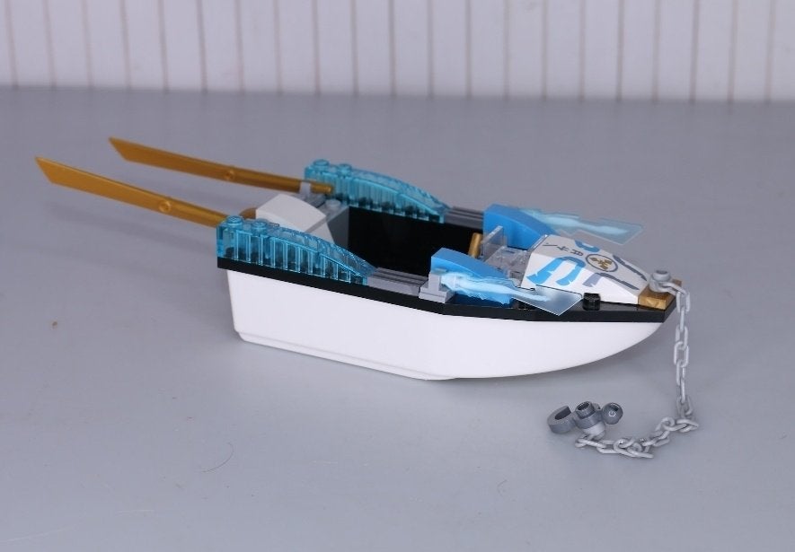 Foto 4 van Lego Juniors ninjago zane's ninjabootachtervolging 10755