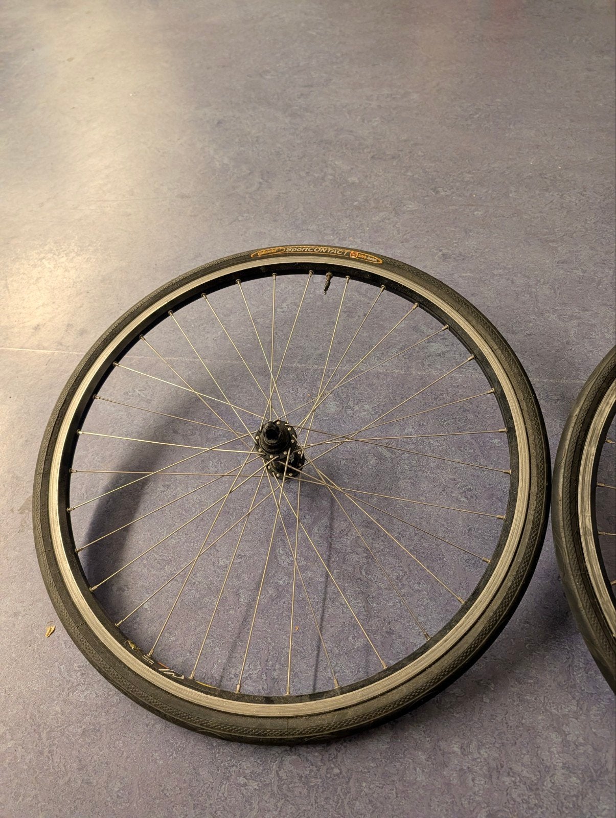 26-inch fietswielen met Continental banden en cassette, Ophalen