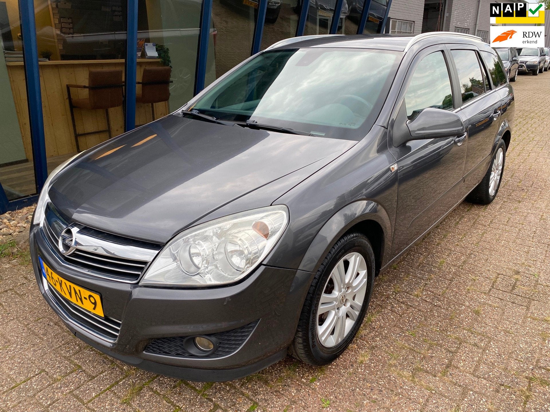 Opel Astra Wagon 1.6 Cosmo LEER / NAVI / TREKHAAK, Auto's, Opel, Voorwielaandrijving, Dealer onderhouden, 15 km/l, Gebruikt