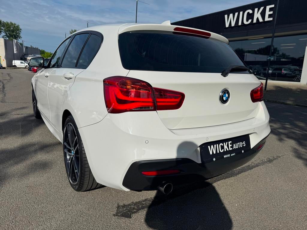 BMW 1-serie 118i Edition M Sport Shadow Executive Dakje Lede, Gebruikt, Wit, Bedrijf, 650 kg