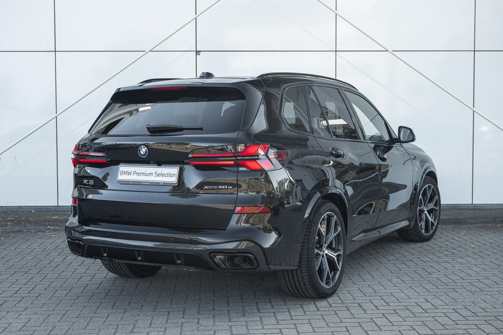 BMW X5 xDrive50e High Executive M Sport Automaat / Panoramad, Auto's, Gebruikt, 2395 kg, Met garantie (alle), Zwart