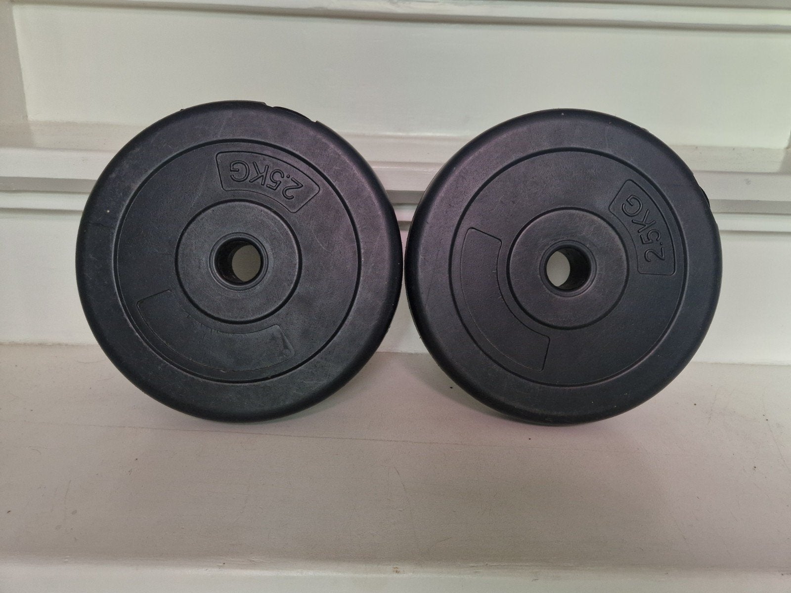 2x 2.5 kg kunststof halterschijven, Ophalen