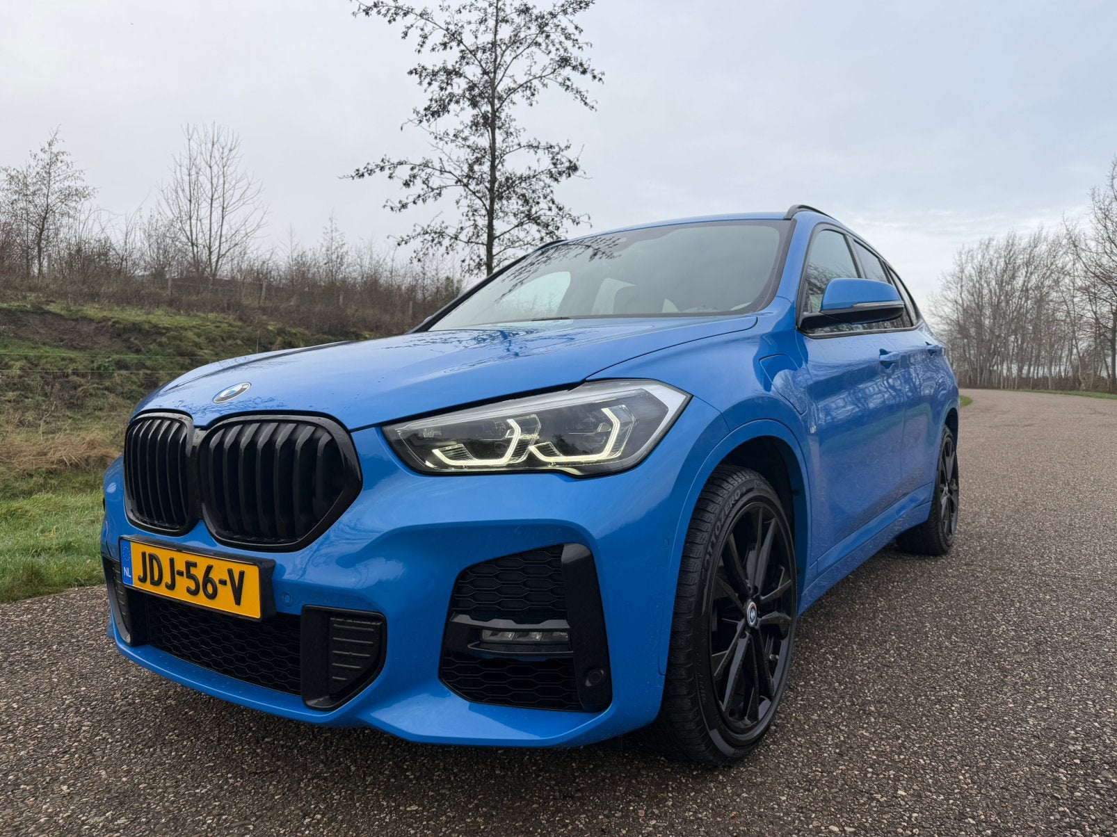 BMW X1 xDrive25e aut |M-Sportpakket|Pano|Leder|HU|Garantie|, Auto's, Blauw, Bedrijf, Parkeerassistent, Vierwielaandrijving