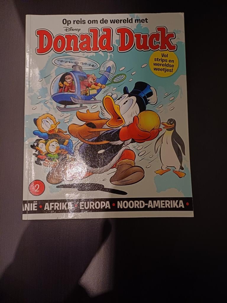 Donald Duck - Op reis om de wereld - Zo goed als nieuw, Boeken, Eén stripboek, Ophalen of Verzenden, Zo goed als nieuw, Disney