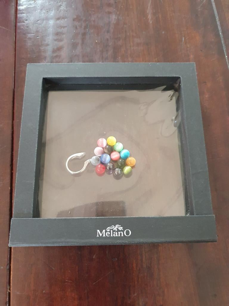 Melano  ring 16 mm met 15 steentjes, Overige merken, Gebruikt, 4 bedels of meer, Met strass