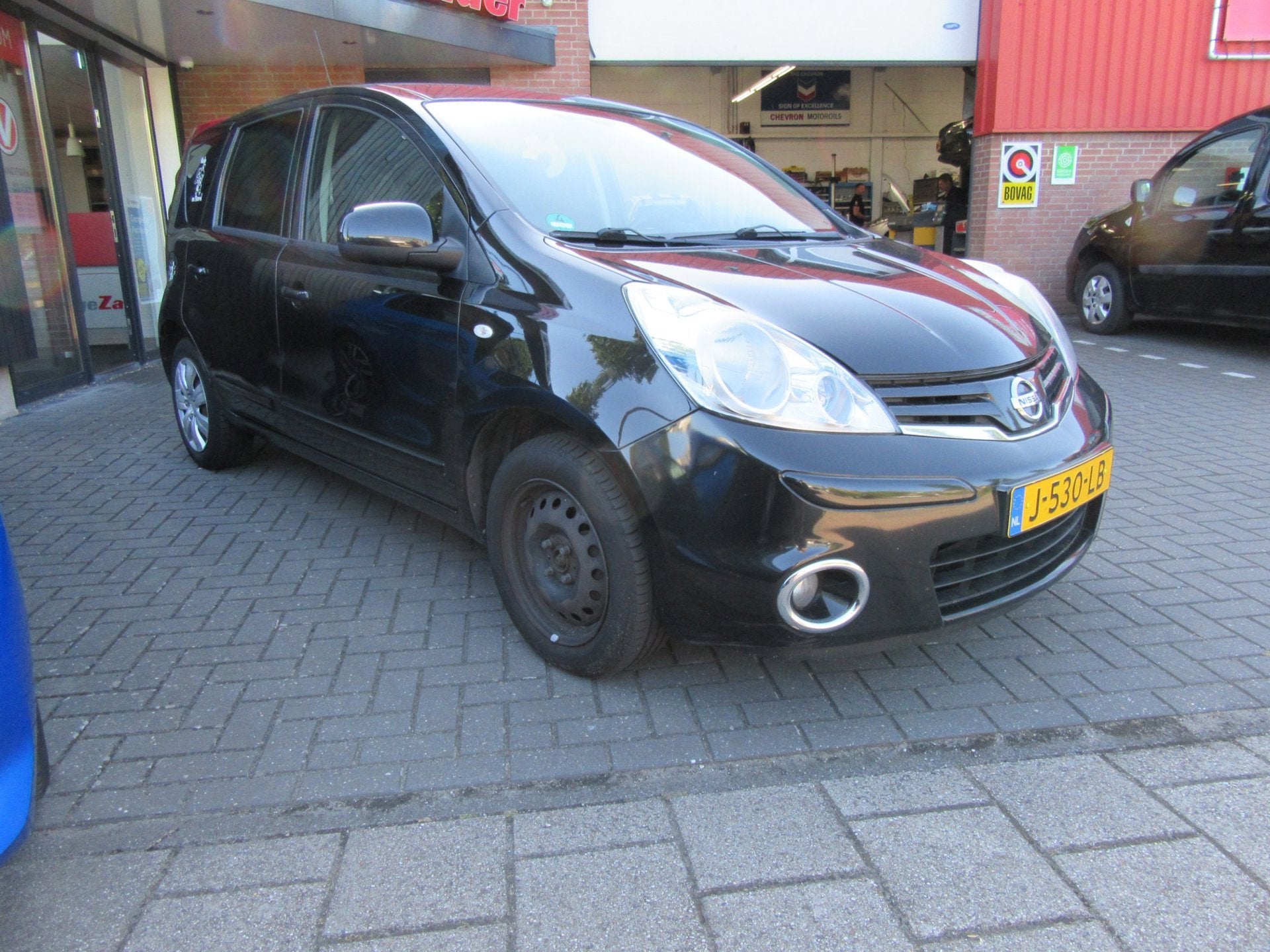 Nissan Note 1.4 Visia, Auto's, Voorwielaandrijving, Euro 5, Gebruikt, Zwart