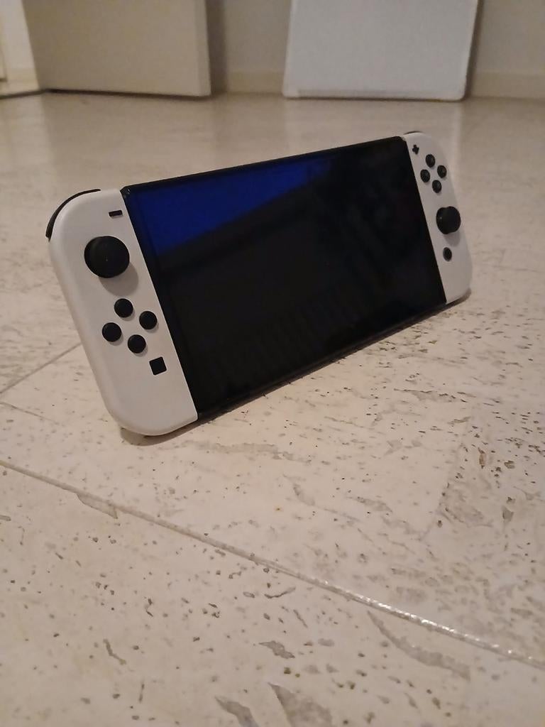 Te koop Nintendo switch oled., Spelcomputers en Games, Ophalen, Zo goed als nieuw, Met 1 controller, Switch OLED