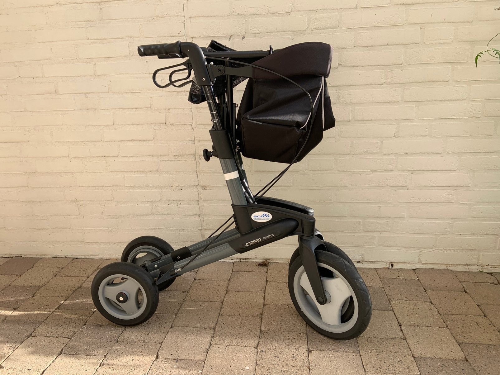 Topro Olympos rollator (maat M) – zwart, met tas en rugband, Ophalen, Lichtgewicht, Zo goed als nieuw