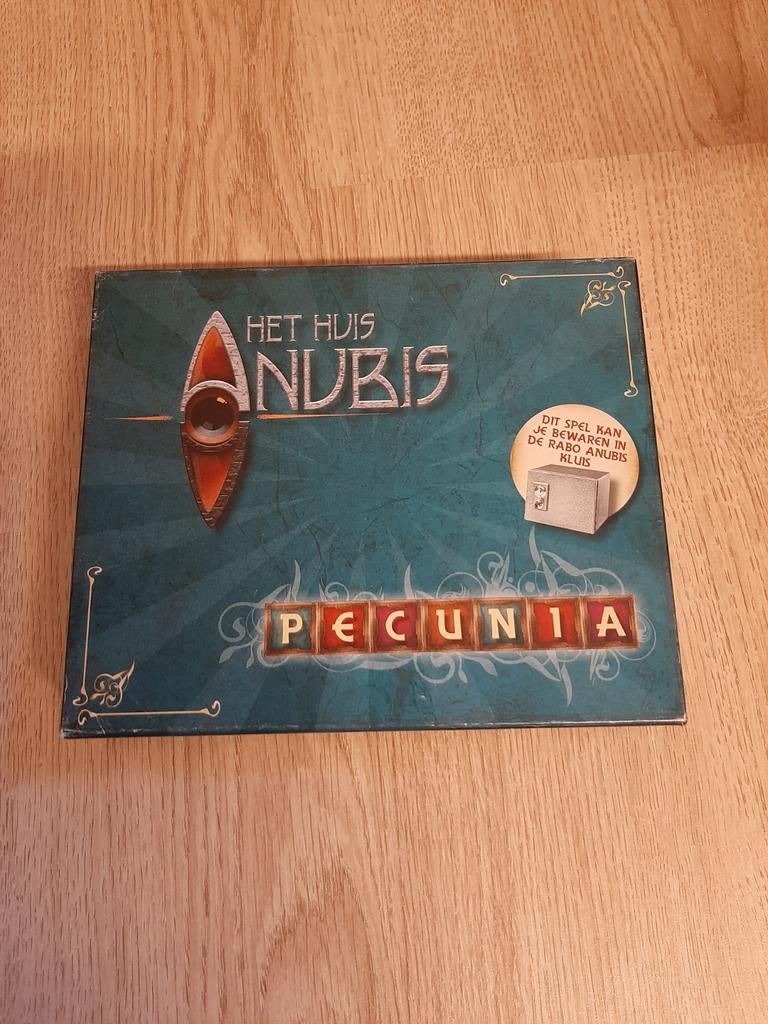Het huis Anubis pecunia spel, Hobby en Vrije tijd, Gezelschapsspellen | Bordspellen, Ophalen of Verzenden