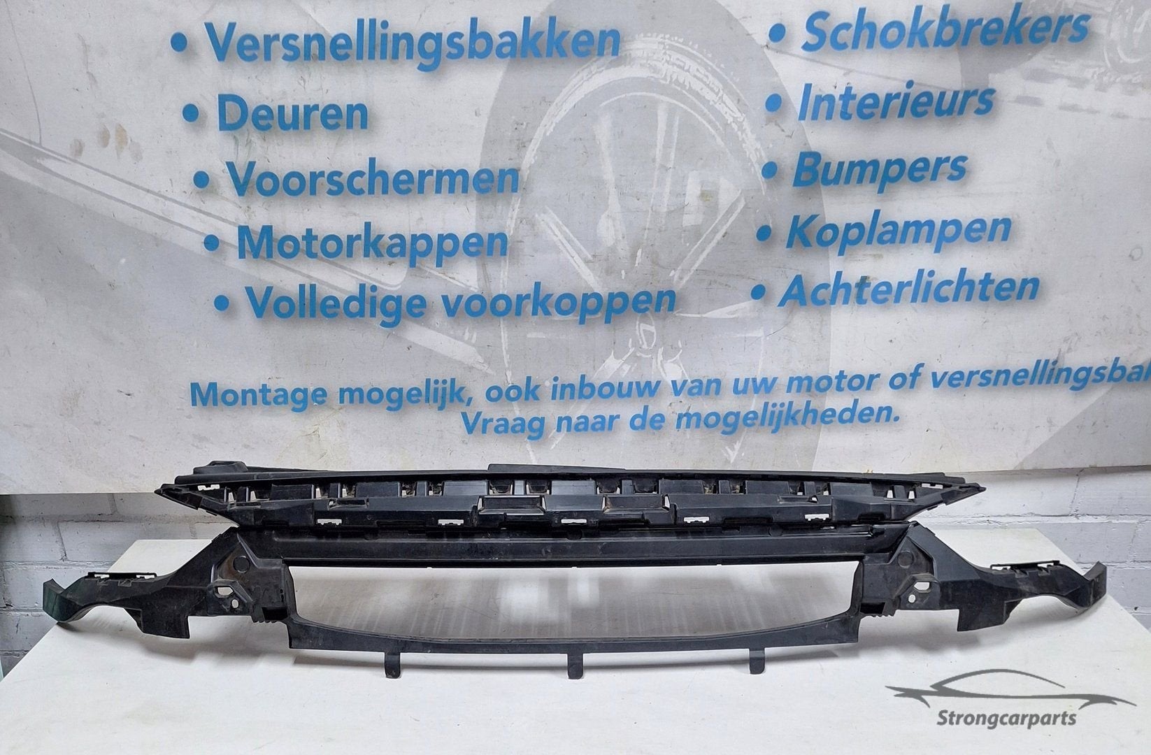 Opel Corsa F Grille houder 9829535680 Origineel, Gebruikt, -, -, Opel