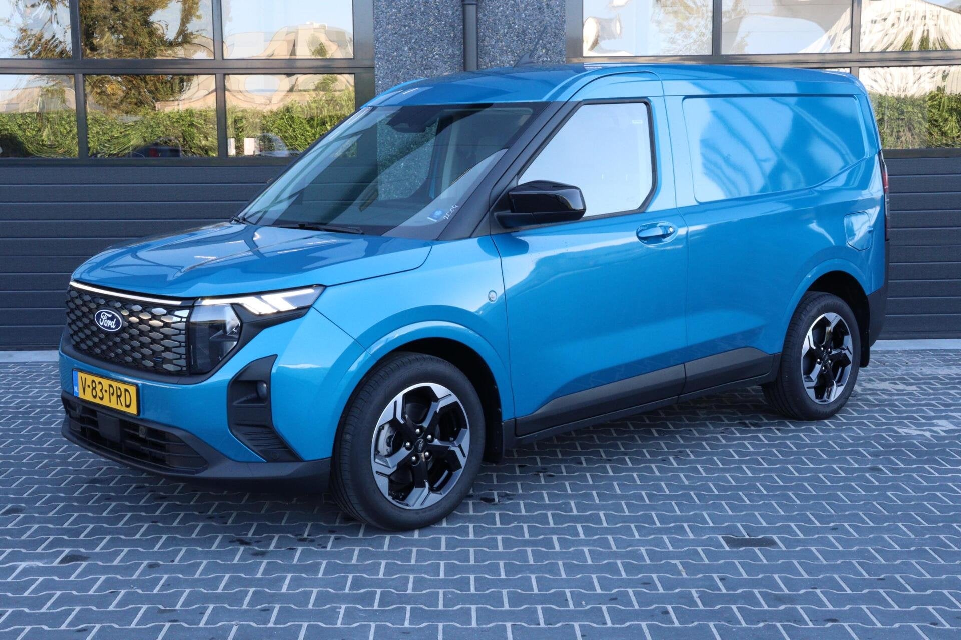 Ford E-Transit Cour. Limited 44 kWh l FULL OPTION l NAVI l C, Dealer onderhouden, Gebruikt, Blauw, 44 kWh