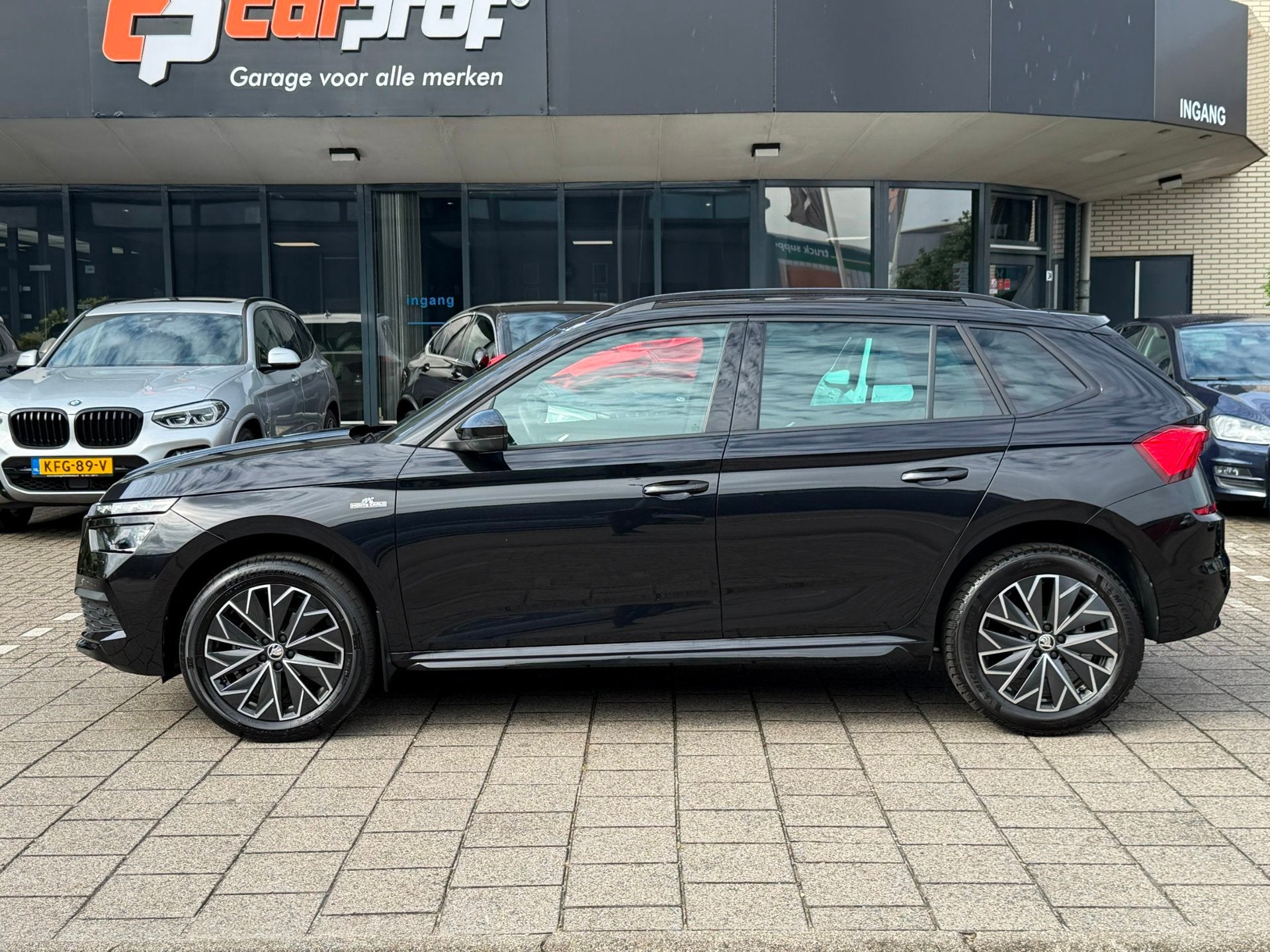 Skoda KAMIQ 1.0 TSI Monte Carlo ACC l DSG l PANO l CARPLAY, Stof, Gebruikt, 620 kg, Zwart