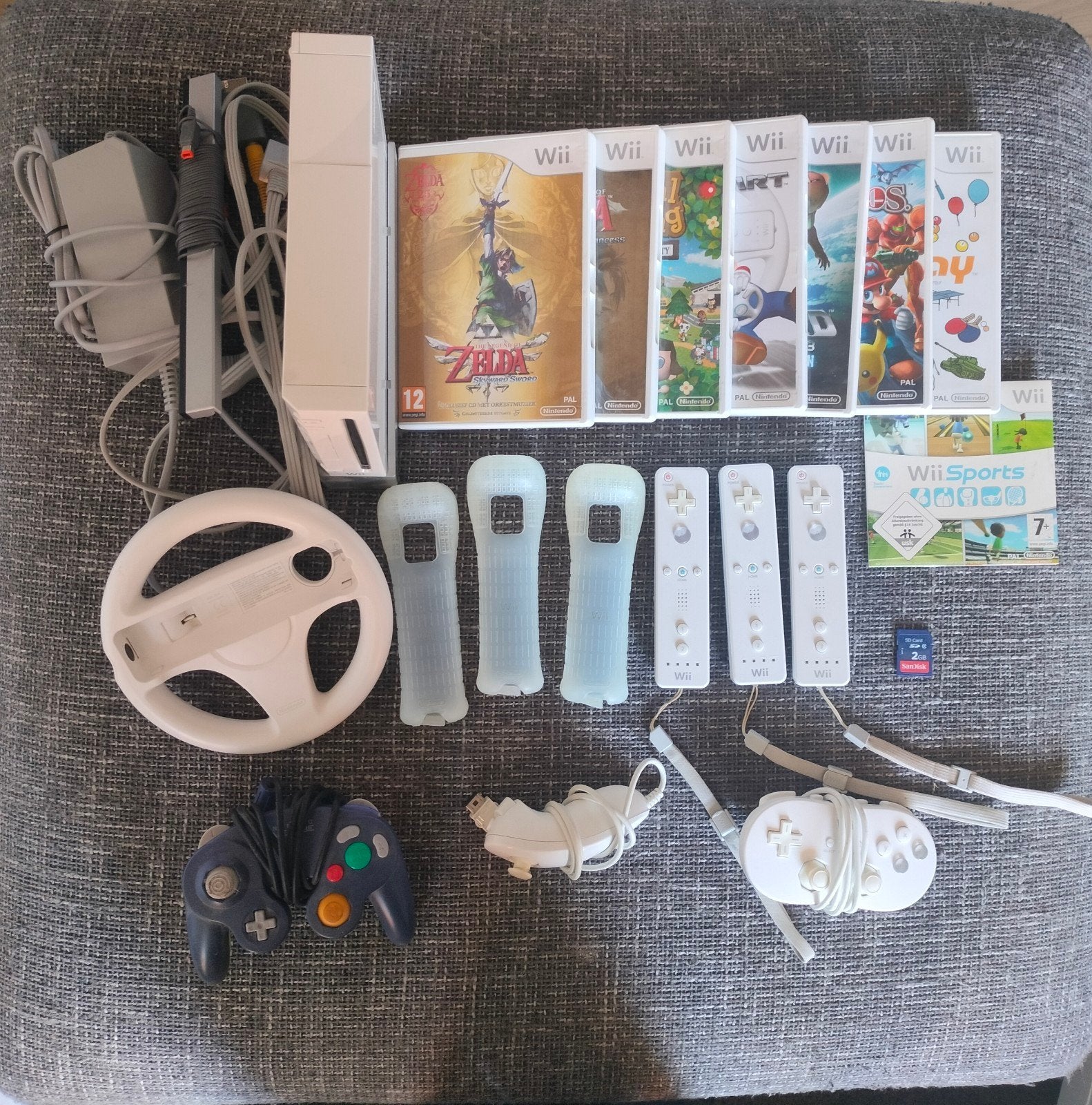 Nintendo Wii met Accessoires en Spellen, Ophalen of Verzenden, Zo goed als nieuw, Met 3 controllers of meer, Met stuurtje