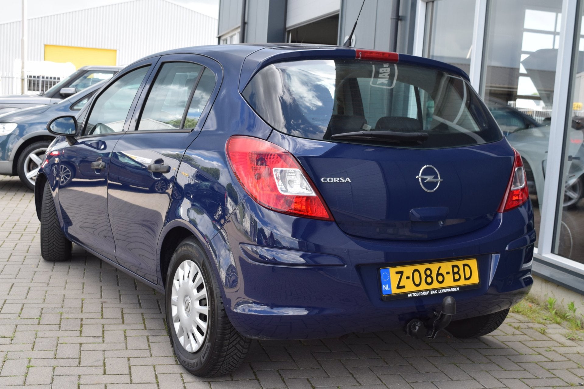 Opel Corsa 1.4-16V Business | Automaat | Airco | APK 6-2027, Auto's, Gebruikt, Zwart, 4 cilinders, Blauw
