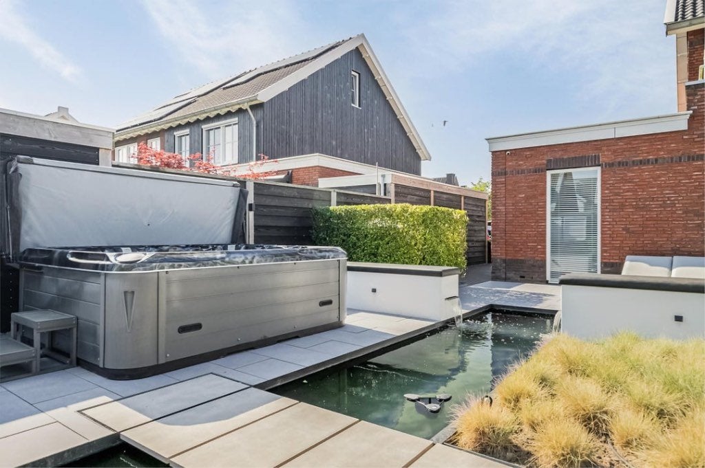 Passions Spas Desire 6-persoons jacuzzi, Tuin en Terras, Ophalen of Verzenden, Zo goed als nieuw, Trap, Vast