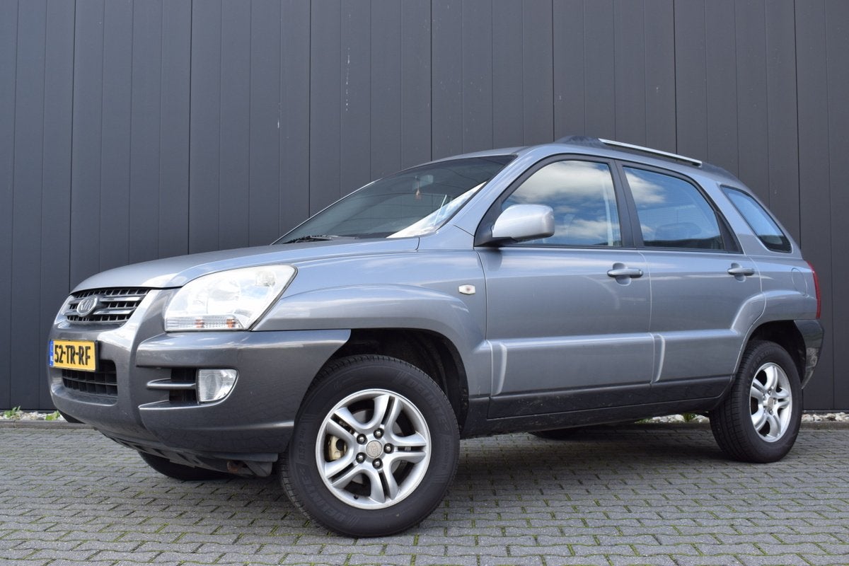 Kia Sportage 2.0 CVVT X-ecutive ECC | Half Leder | Carplay |, 1442 kg, Gebruikt, Zwart, 4 cilinders