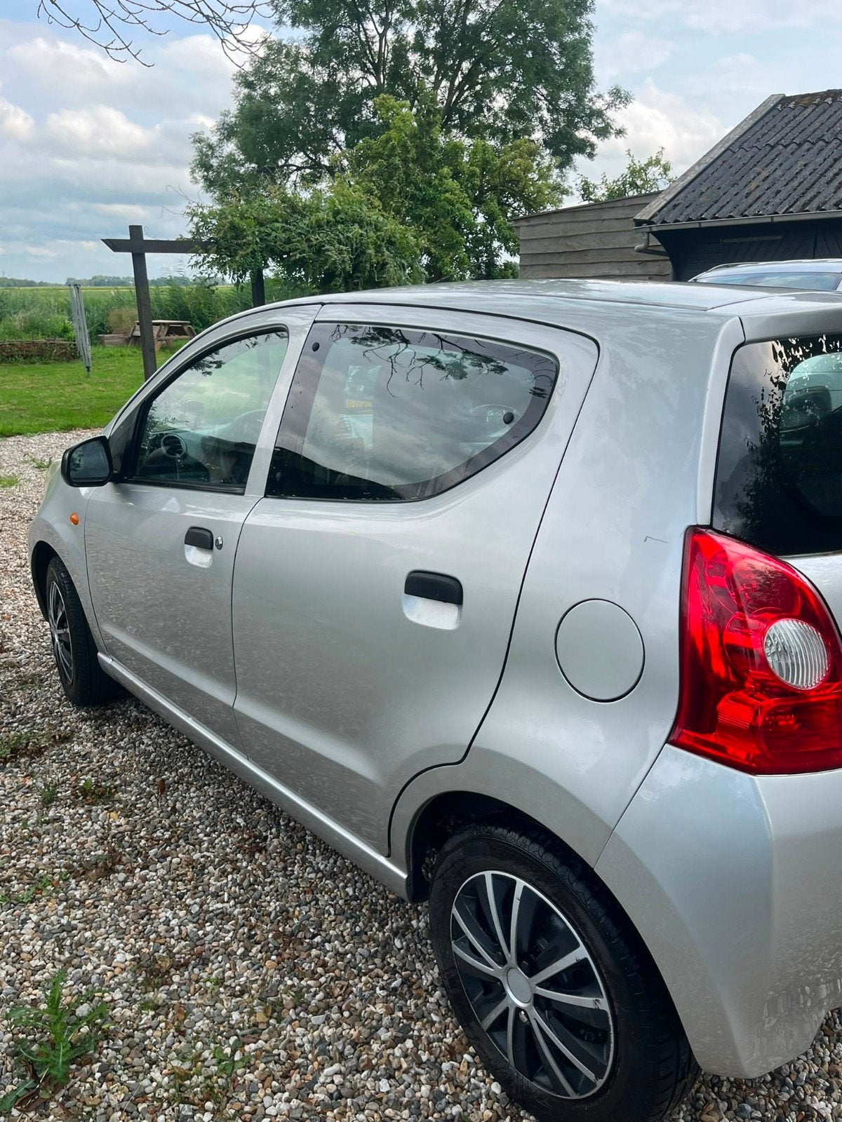 Suzuki Alto 1.0 2010 Grijs, Auto's, Voorwielaandrijving, 200 kg, 4 stoelen, Origineel Nederlands