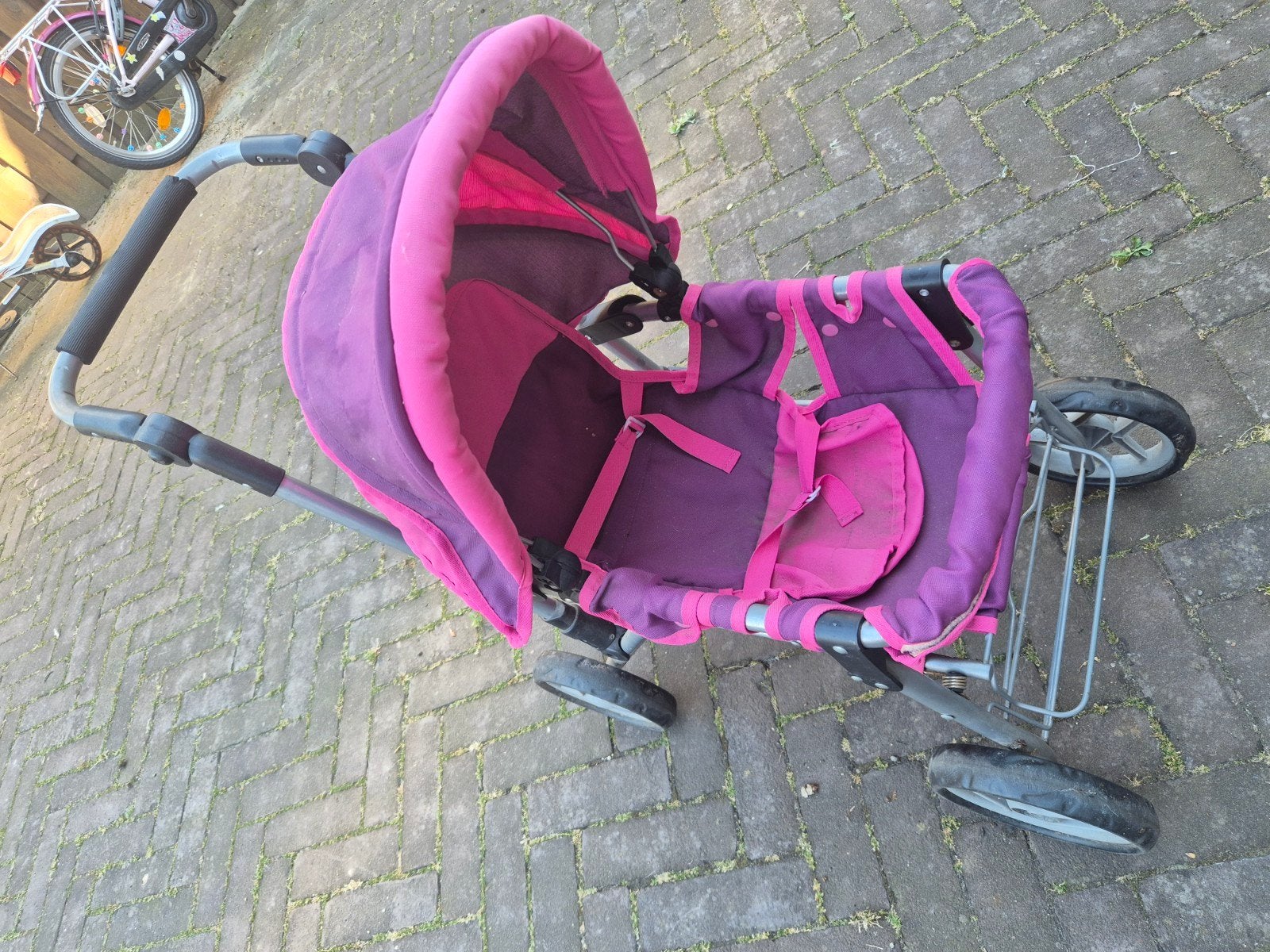 Gebruikte poppenwagen met verstelbaar handvat en kap, Ophalen