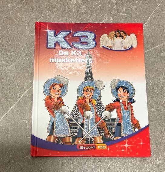 K3 De 3 Musketiers - Studio 100 Boek, Ophalen of Verzenden, Zo goed als nieuw, Fictie algemeen