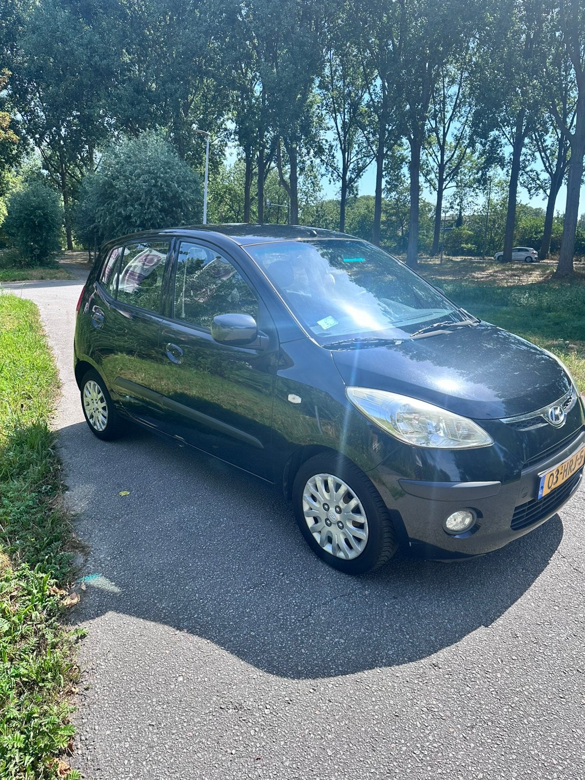 Hyundai i10 1.25 I 5DR 2009 Zwart, Auto's, Voorwielaandrijving, 4 cilinders, Origineel Nederlands, Handgeschakeld