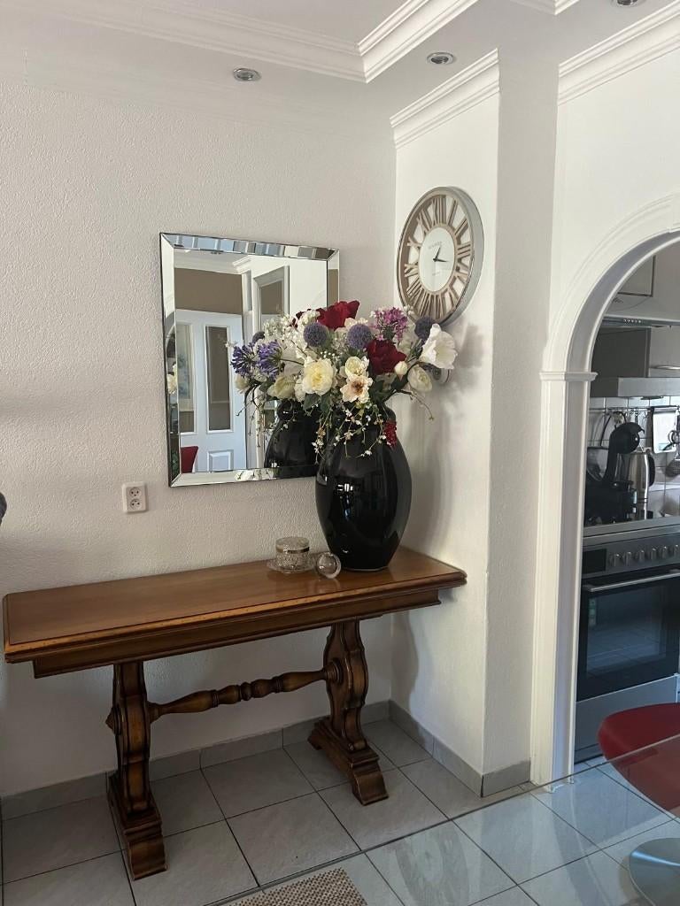 Uitschuifbare houten tafel, Ophalen