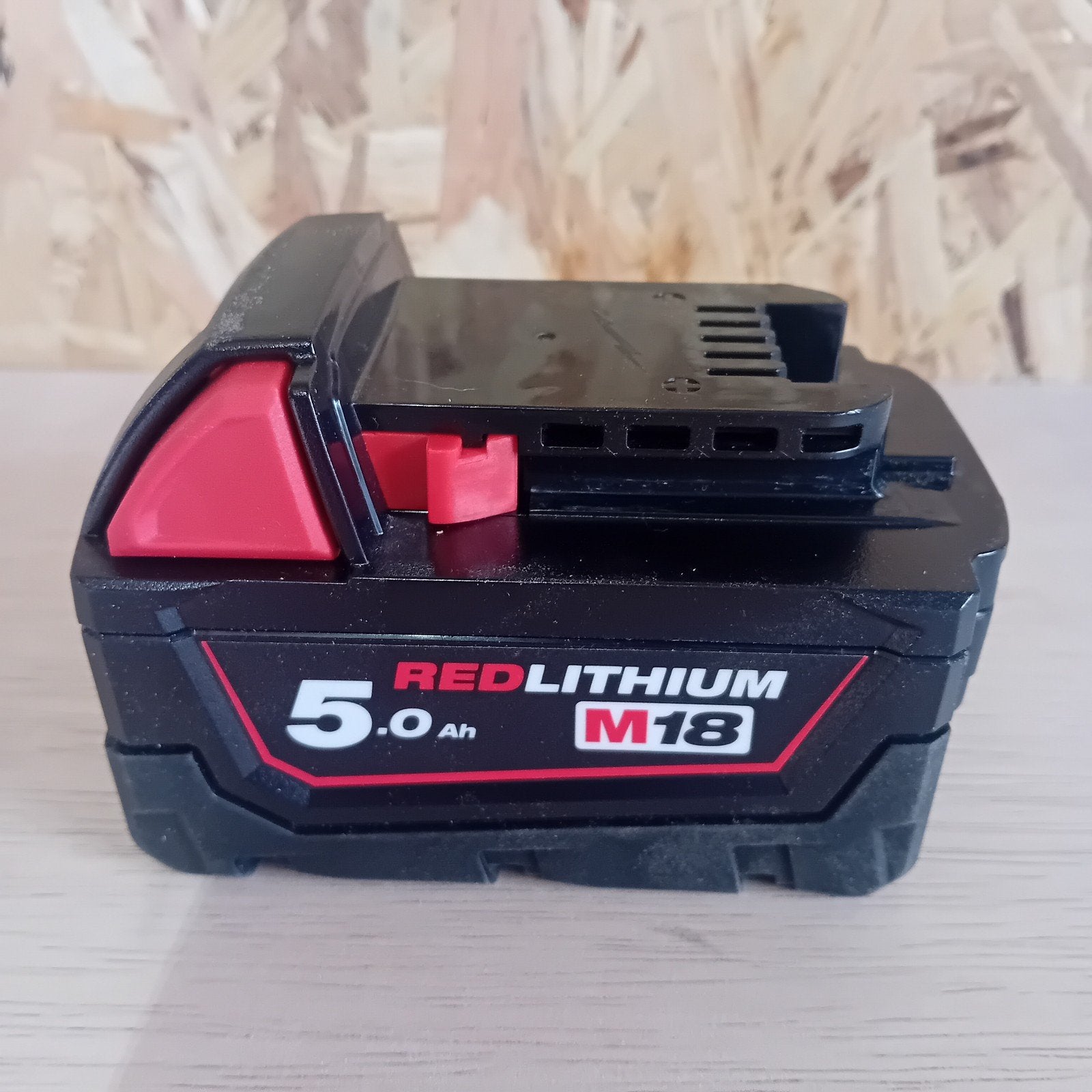 Milwaukee M18 B5 18V Li-ion Accu 5.0 Ah Nieuw, Ophalen, Zo goed als nieuw