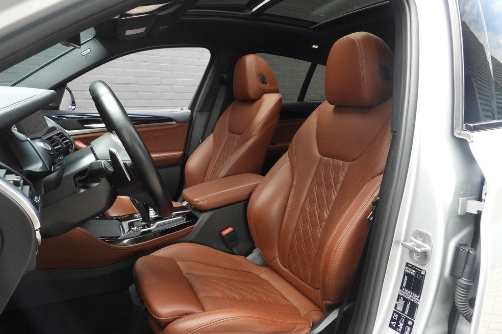 BMW X4 M40i Automaat / Panoramadak / Trekhaak / Sportstoelen, Auto's, BMW, Gebruikt, Met garantie (alle), Leder, Bedrijf