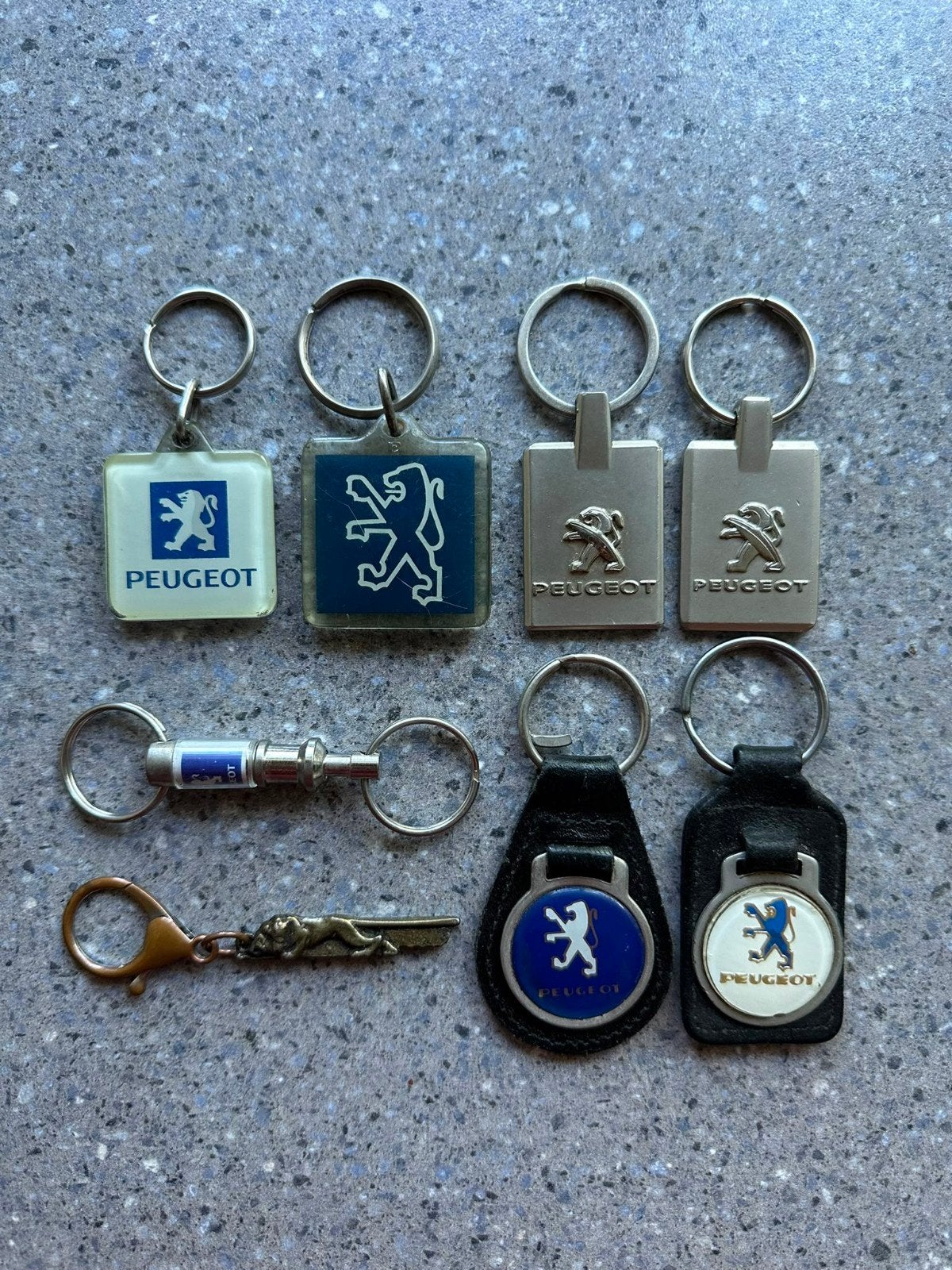 8x Peugeot sleutelhangers, Verzamelen, Sleutelhangers, Ophalen of Verzenden, Gebruikt, Merk