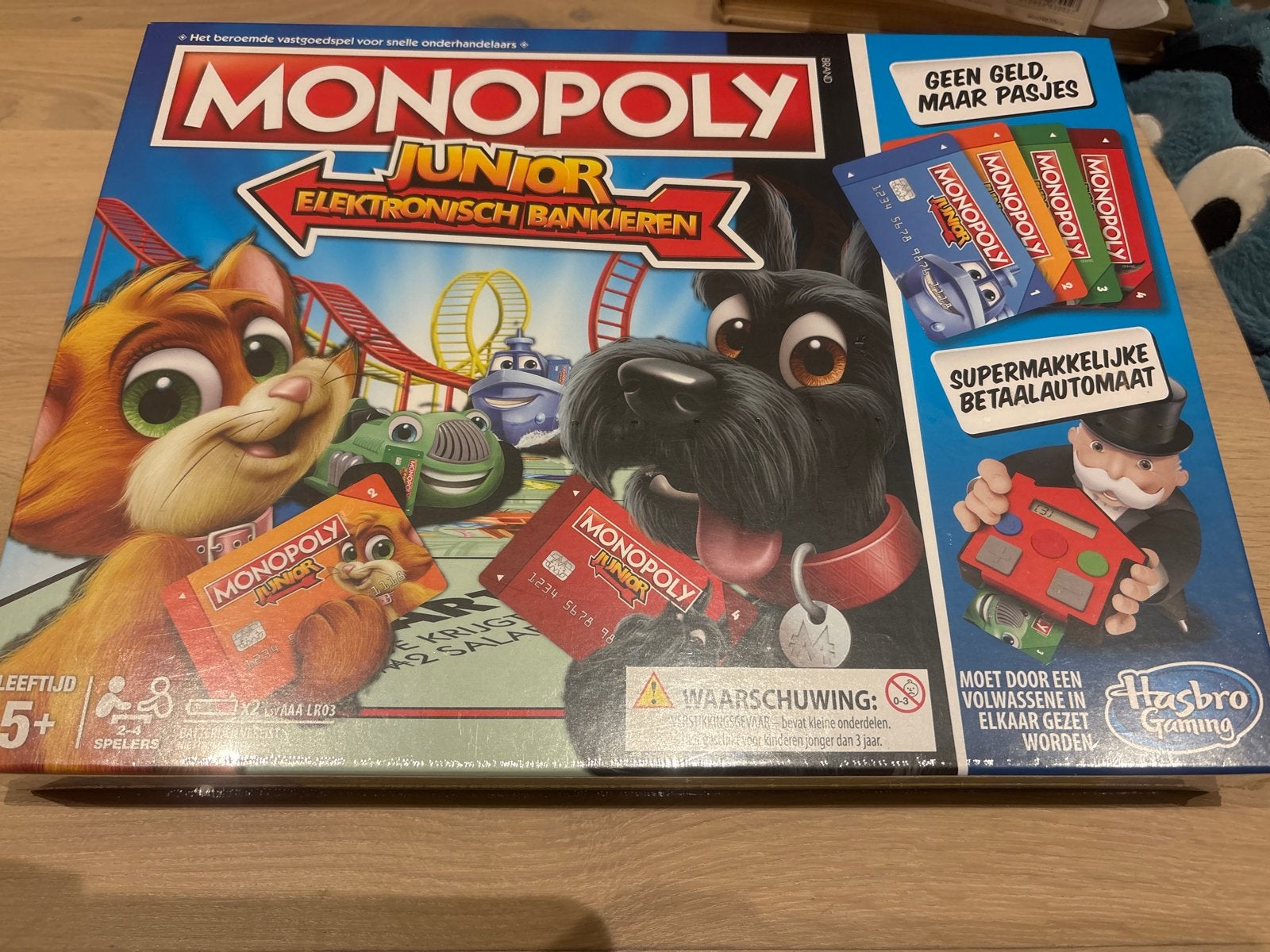 Monopoly Junior Elektronisch Bankieren - Zo goed als nieuw, Hobby en Vrije tijd, Een of twee spelers, Ophalen of Verzenden, Nieuw