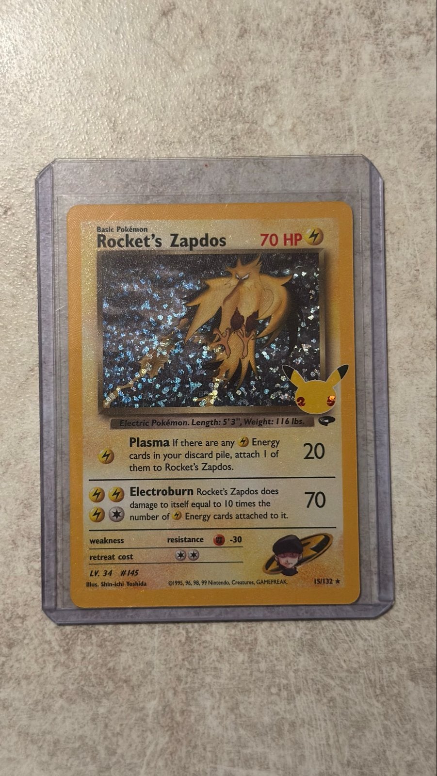 Rocket's Zapdos Pokémon kaart (Celebrations 25th Anniversary, Ophalen of Verzenden, Zo goed als nieuw, Losse kaart, Foil