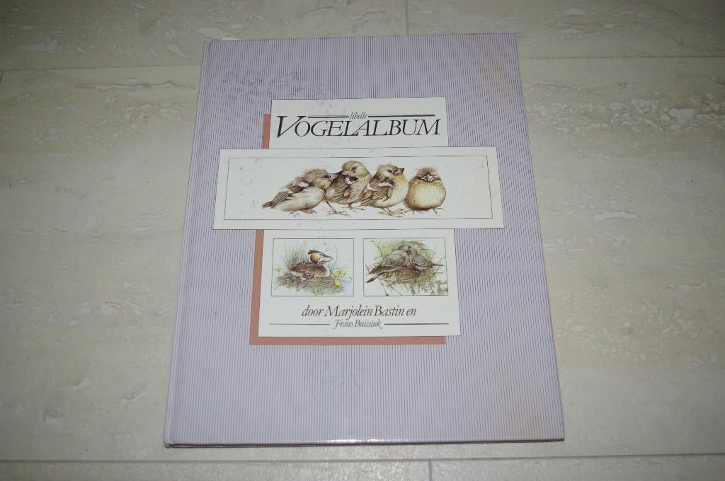 Libelle Vogelalbum door Marjolein Bastin en Frans Buissink., Ophalen of Verzenden, Zo goed als nieuw