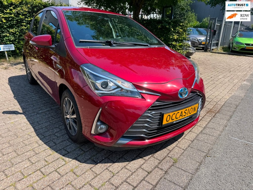 Toyota Yaris 1.5 Hybrid Dynamic Y20 jubileum uitvoering, cru, Auto's, Gebruikt, 4 cilinders, Met garantie (alle), Origineel Nederlands
