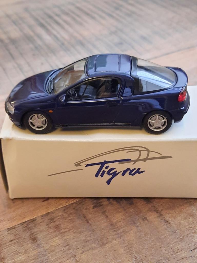 Opel Tigra miniatuur blauw, Hobby en Vrije tijd, Ophalen of Verzenden, Nieuw, Auto