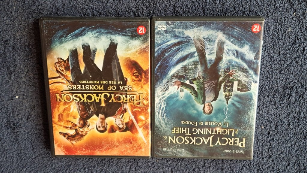 Percy Jackson 1 & 2, Vanaf 12 jaar, Ophalen of Verzenden, Zo goed als nieuw