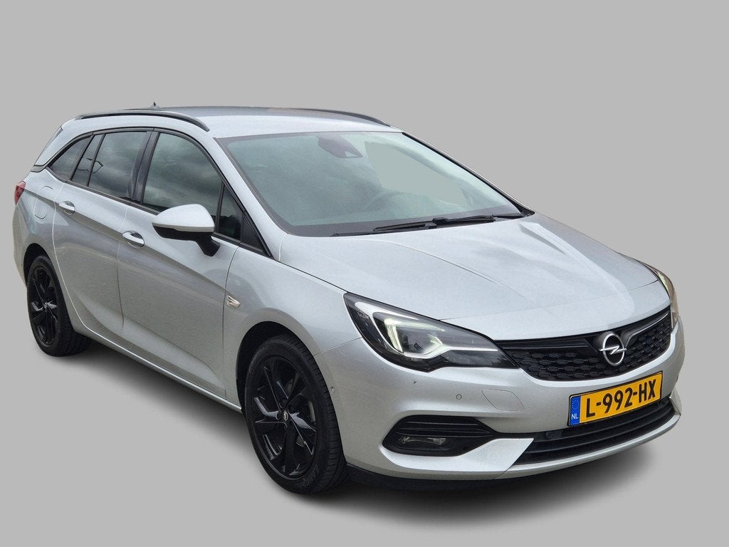 Opel Astra Sports Tourer 1.4 Ultimate Automaat, Trekhaak, Na, Auto's, Opel, Gebruikt, 146 pk, Grijs, 3 cilinders