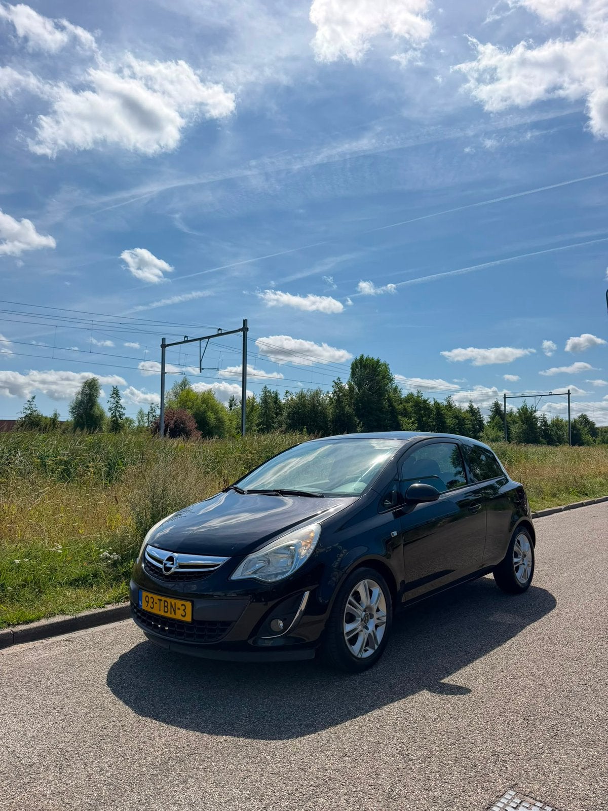 Opel Corsa 1.2 16V 2012 Zwart BT audio Trekhaak APK, Auto's, Opel, Voorwielaandrijving, Euro 5, 40 €/maand, Zwart