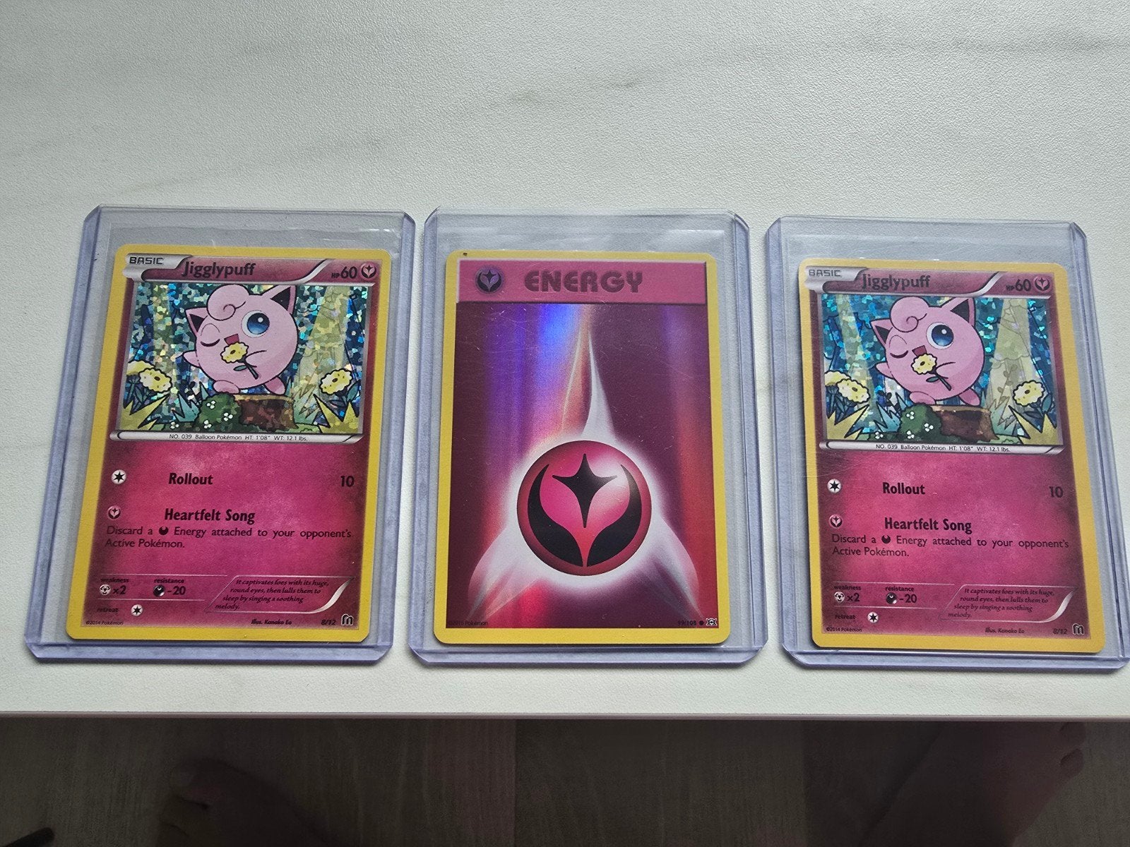 Jigglypuff en Foil Energy Pokémon kaarten, Ophalen of Verzenden, Zo goed als nieuw, Meerdere kaarten, Foil