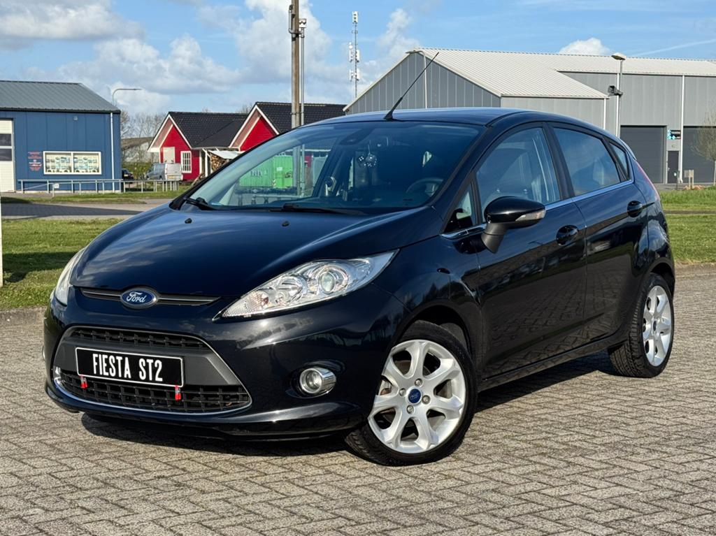 Ford Fiësta 1.25 82pk Titanium 5DR 2012 Zwart (Lage Kmstand), Auto's, Voorwielaandrijving, Euro 5, Stof, 82 pk