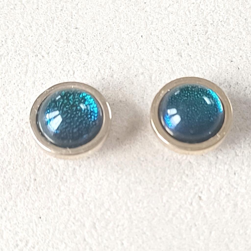 Set van 2 goudkleurige Melano vivid shimmer blauw 7mm, Verzenden