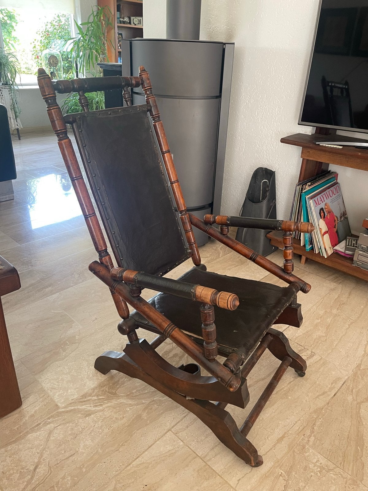 Antieke schommelstoel met lederen bekleding, Ophalen