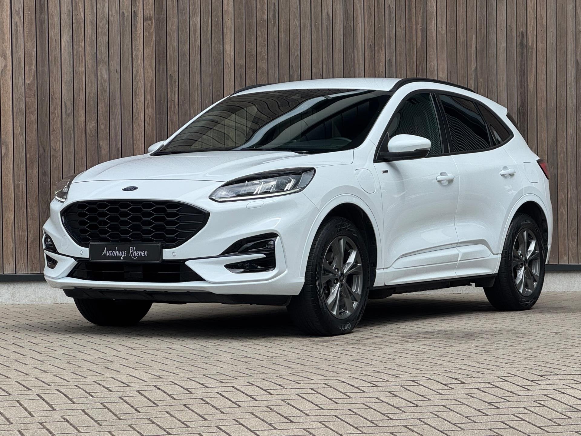 Ford Kuga 2.5 PHEV ST-Line / Winterpack / Cruise / 18'' /, Gebruikt, Zwart, 4 cilinders, Wit