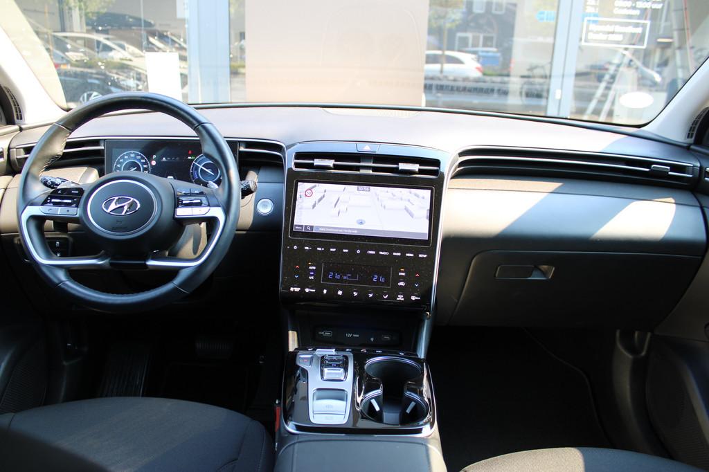 Hyundai TUCSON 1.6 T-GDI PHEV Comfort Smart 4WD PHEV 265pk 4, Auto's, Stof, Gebruikt, 4 cilinders, Wit