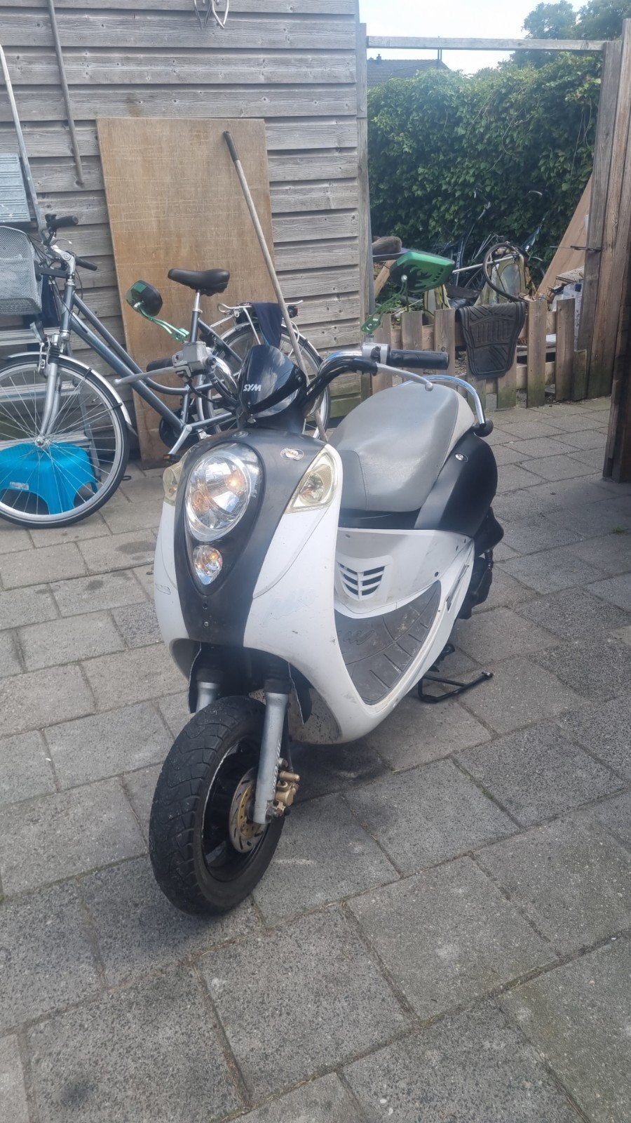 Sym mio 50 snor Wokmelding Tekoop., Fietsen en Brommers, Scooters | SYM, Gebruikt, Benzine, 50 cc, Maximaal 25 km/u