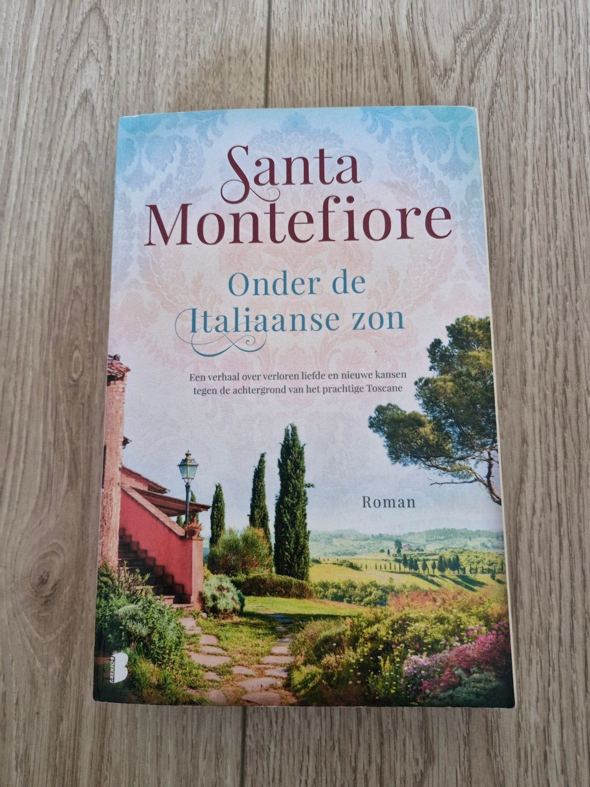Boek santa montefiore - onder Italiaanse zon, Boeken, Chicklit, Ophalen of Verzenden, Zo goed als nieuw