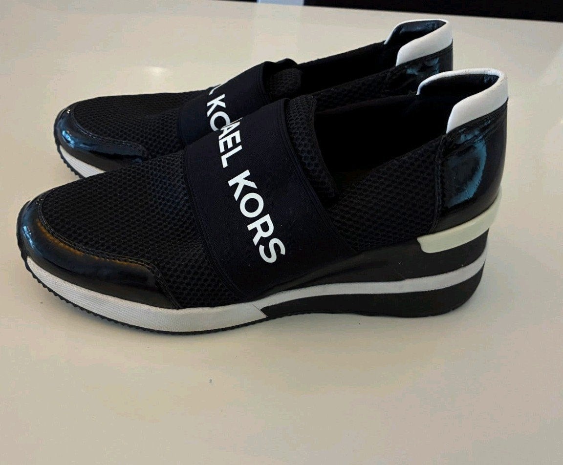 Michael Kors Zwarte Sneakers - Zo goed als nieuw, Michael Kors, Zwart, Ophalen of Verzenden, Sneakers of Gympen
