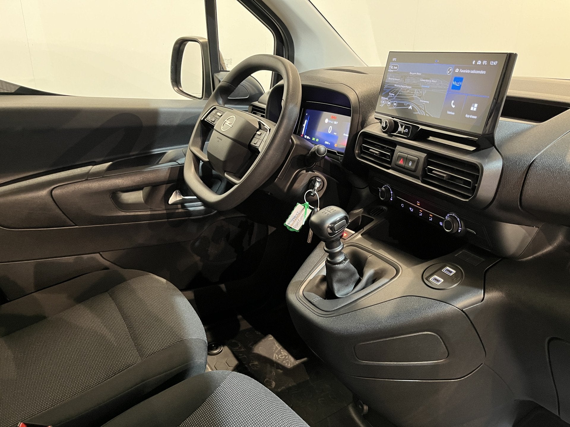 Opel Combo 1.5 BlueHDi 100 S&S L2 / Euro 6 / Inrichting / Ai, Auto's, Voorwielaandrijving, Verwarmde buitenspiegels, Stof, Gebruikt